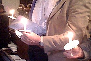 candles held during a candlemas church service